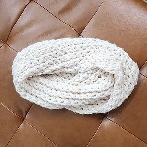 Infinity scarf. Off-white/cream colored with gold threading.